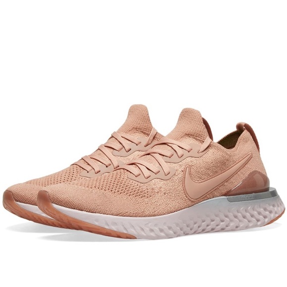 nike running epic react flyknit trainers in white and rose gold